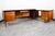 Outstanding executive desk with all kinds of unique features: Black formica top surface, walnut construction, cane front,...