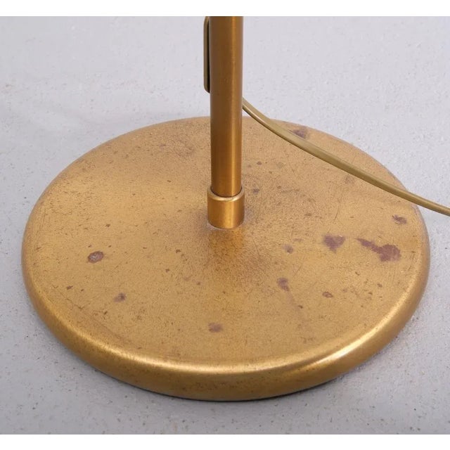 Very nice Holtkotter swing arm Floor lamp . Brass Halogen comes with a good working dimmer, adjustable in height,...