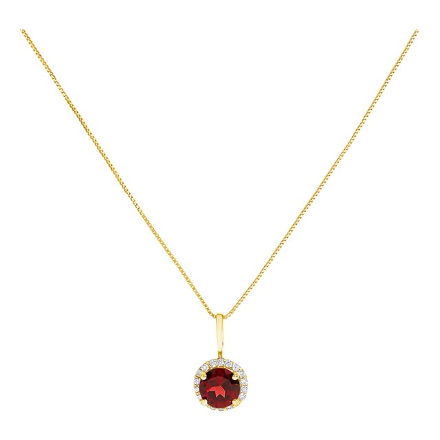 10K Yellow Gold Red Garnet and 1/10 Cttw Diamond Accent Halo Pendant Necklace For Sale