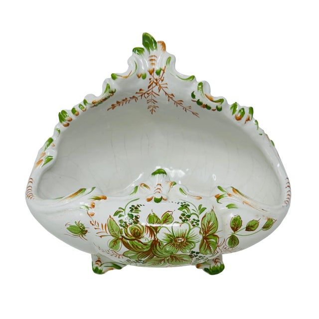 Crafted from high-quality ceramic and painted by hand with intricate details, this bowl showcases a unique blend of...