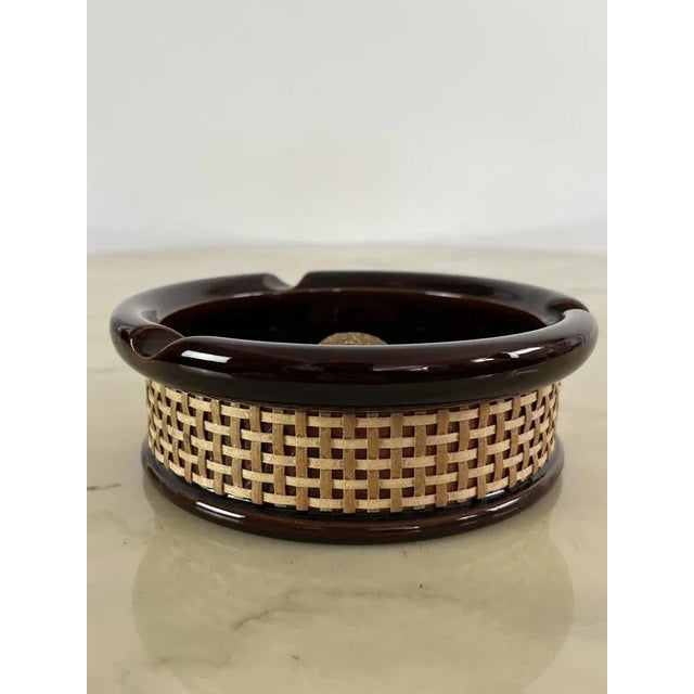 Particularly enamelled ceramic, wicker and cork leavener. Dates back to the 70s. Very good condition. Small signs of the...