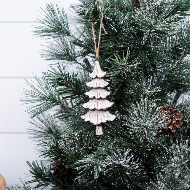 Enhance your holiday decor with our Carved Pine Tree Ornament Set, a charming collection that will bring warmth and rustic...