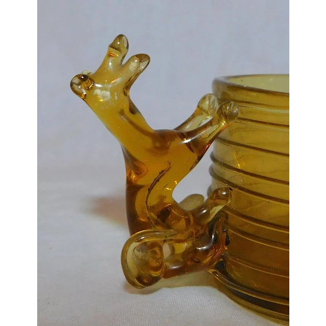 Absolutely beautiful handblown Italian glass child's mug. Sweet dog-shaped handle. A few fleabites around the base,...