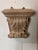 Pair of carved wood wall brackets with molded shelf tops over bold acanthus leaves and scrolled sides, in a pale bleached...