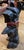 Original Painted Iron Scotty Dog Doorstop. black cast iron in amazing patina. The bow in the dog is painted red and has...