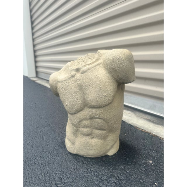 Plaster torso of a man. Felt bottom underneath the base. Stands upright.