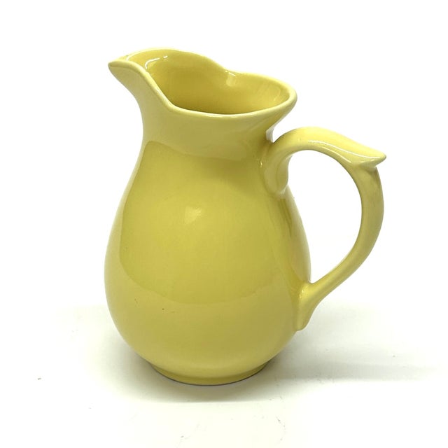 Citrus motif ceramic pitchers, group of 3. A beautiful assortment of citrus colored, orange, yellow, and green pitchers...