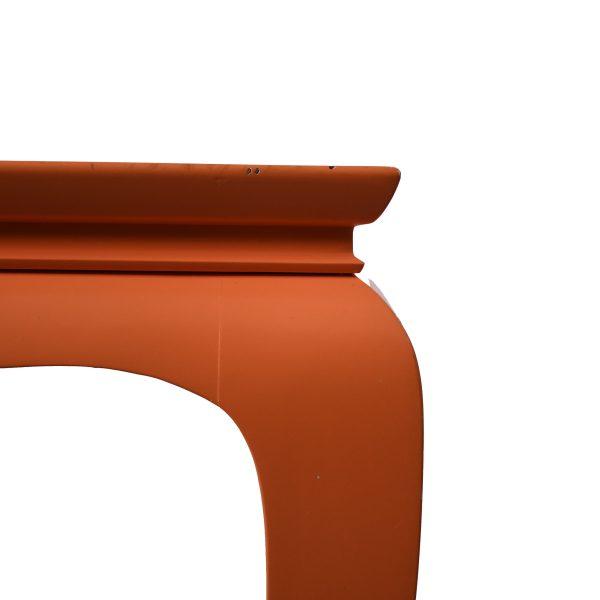 A vintage Ming-style coffee table in a bold orange lacquer, a statement piece that energizes any sitting area. The classic...