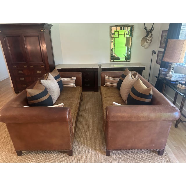 An exceptional pair of Ralph Lauren Home Brompton sofas, beautifully combining classic English-inspired design with the...