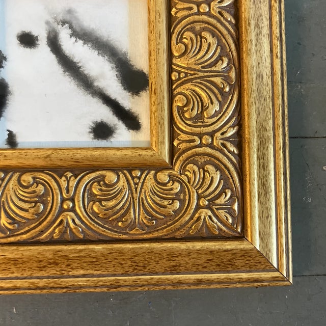 Contemporary original abstract black ink painting in chunky gold frame. Measures 4x4 or 10.5x10.5 with frame.
