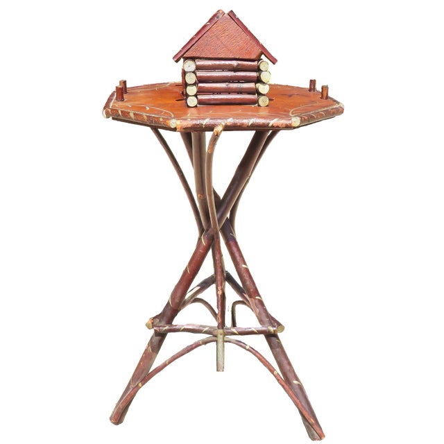 What is not to love about this quirky, folk art accent table? Charming to the max! Truly a conversation piece with its log...