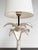 Then you must take a good look at this table lamp! This striking palm tree-shaped lamp is made of white glazed ceramic...