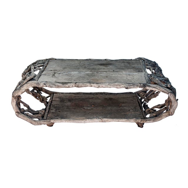 Asian handcrafted driftwood indoor/outdoor coffee table. This table has 2 chairs, by the same artist which are each listed...