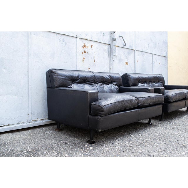 Two-seater sofa with leather upholstery and wooden feet. Model Square Designer Marco Zanuso Manufacturer Arflex Year 1962...