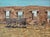 Wagon at Fort Union Ruins Oil Painting by Connie Blake (1946-2026). It depicts an old wagon in front of Fort Union, the...