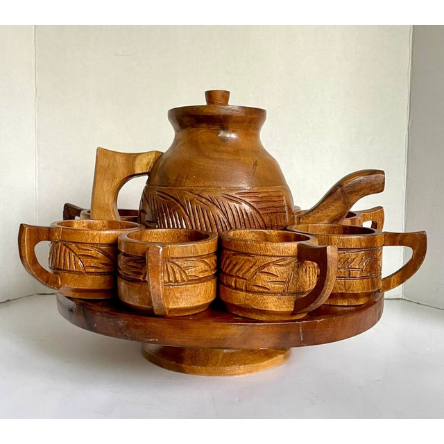 Here is a wonderful tea set that comes with everything you need for a party of 8. Each piece is hand-carved from solid...