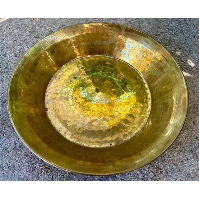 This beautiful dish has exceptional hand hammered detail throughout. It is brass plated over copper and gleams beautifully...