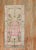 2nd Quarter of the 20th century Tibetan Rug in feminine colors. The border consists soft brown, pink and white swastikas...