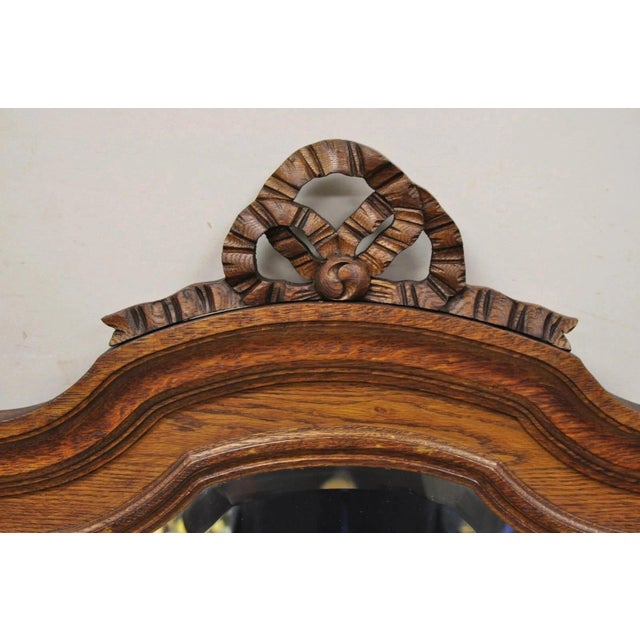 Antique Victorian Carved Oak Wood Ribbon Crest Beveled Glass Wall Mirror For Sale - Image 4 of 10