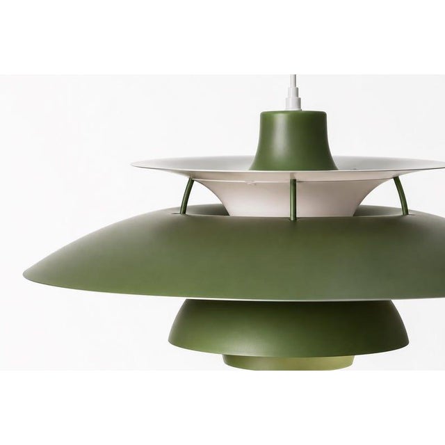 A beautiful balance of color, form, and function, this Danish Modern Green Pendant Light is designed to become a...