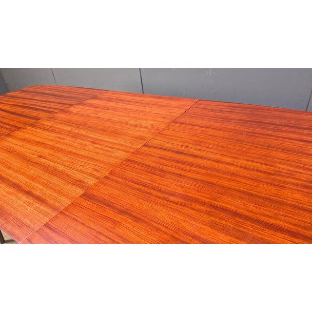 Beautiful and elegant dining table designed by Alfred hendrickx for belform in 1958. Gorgeous wooden extendable top...