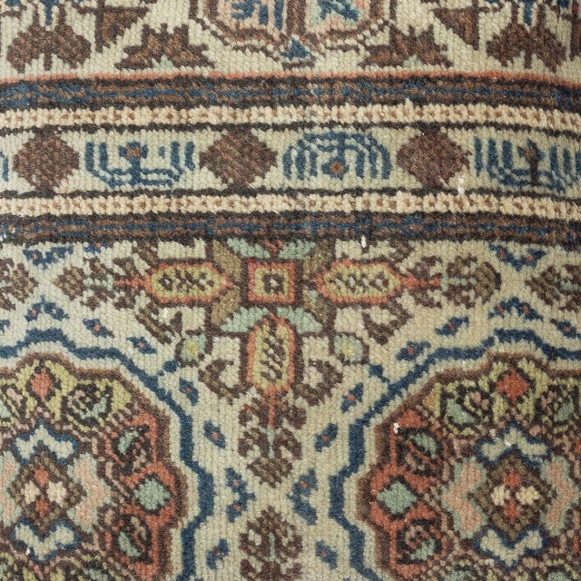 Add a touch of history and warmth to your space with this vintage handmade Turkish wool rug cushion cover. Crafted from...