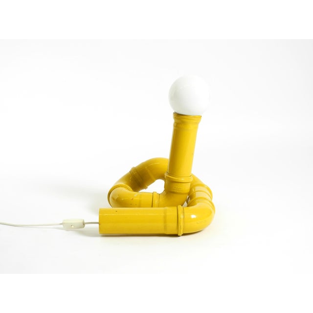 Rare pop art yellow floor lamp made of plastic tubing. manufactured in 1971 by wavin. Made in italy. great, typical...