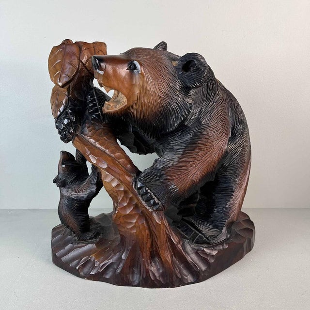 Hand-carved wooden bear scene (Kibori Kuma). Typical carvings of the indigenous Japanese people, the Ainu. Berin and cub...