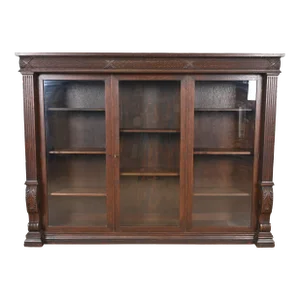 R. J. Horner Style American Empire Carved Oak Glass Front Triple Bookcase, Circa 1900