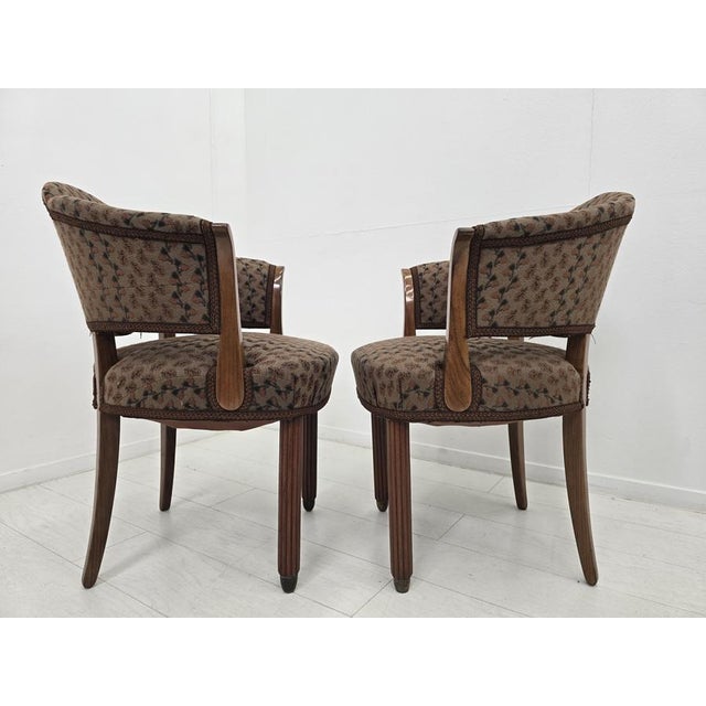 These elegant armchairs are executed in the refined spirit of French Art Deco, showing strong stylistic affinities to the...