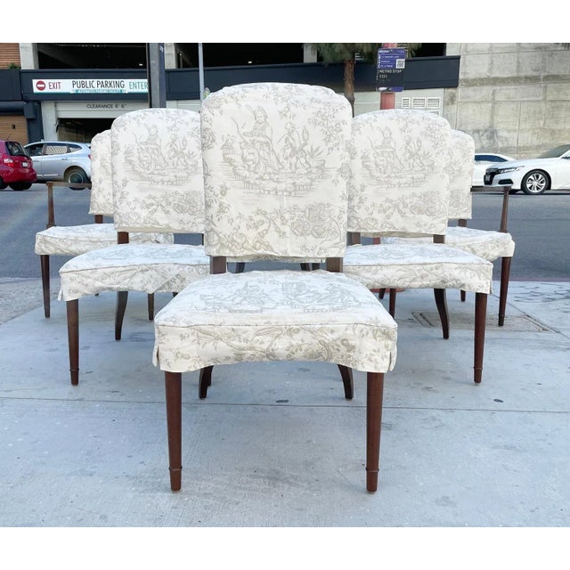 Beautiful set of 6 dining chairs, consisting of 2 arm chairs and 4 side chairs.The chairs are upholstered in white muslin...