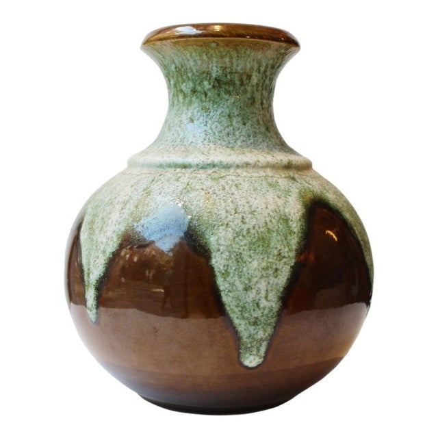 German ceramic vase produced in the 1970s in the West German Pottery tradition. The piece features a richly textured...