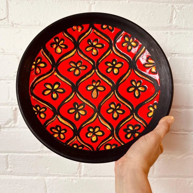 Alvino Bagni thick wall, high footed bowl or plate. Beautiful red and yellow against matte black background. Signed and...