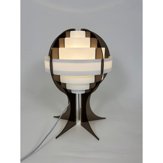 This extraordinary lamp was designed in Denmark in the 1960s by Flemming Brylle and Preben Jacobsen and manufactured by...