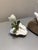 Grasping by Ashley Folkner | Mixed Media Sculpture of a flower on a rock For Sale