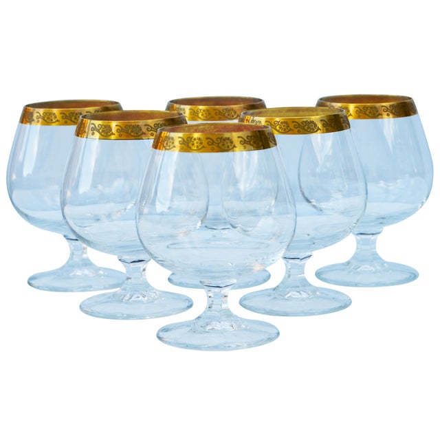 Set of six midcentury crystal snifter/brandy glasses with intricate gold detail on rims. No maker's mark. This beautiful...