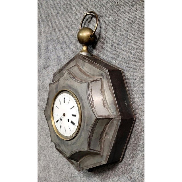 Hexagonal sheet metal wall clock in the charles x style mechanical mechanism needs servicing dimensions: h49 x w36 x d11