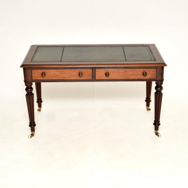 A smart and extremely well made antique Victorian writing table / desk. This was made in England, it dates from around the...