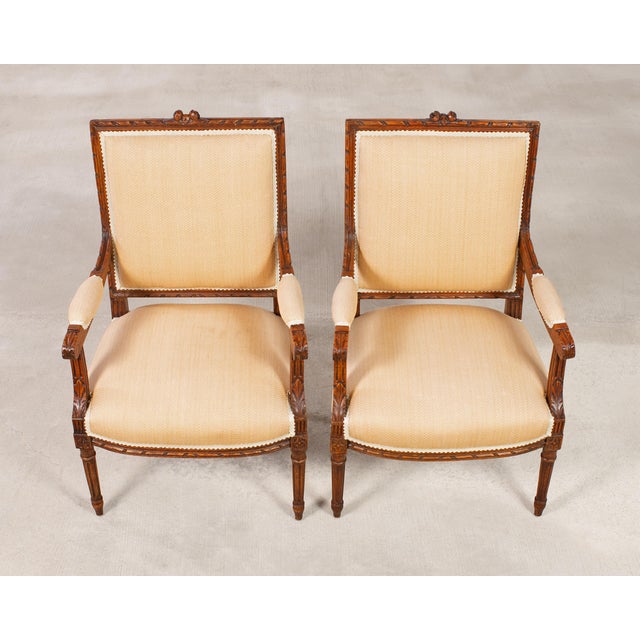 Wood Pair of French Louis XVI Carved Walnut Fauteuil Armchairs For Sale - Image 7 of 17
