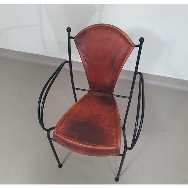 24 chairs in leather and solid wrought iron / very heavy