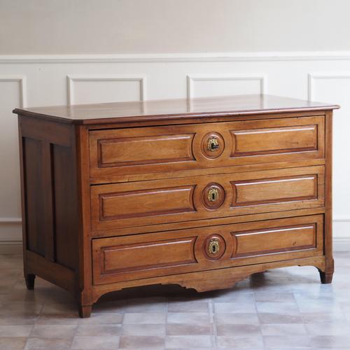A walnut chest of drawers in the louis xvi style, crafted in the 19th century in the style of late 18th-century french...