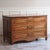 A walnut chest of drawers in the louis xvi style, crafted in the 19th century in the style of late 18th-century french...