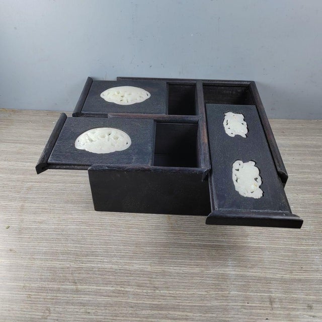 A beautiful Chinese scholar's box crafted from dark rosewood (likely Zitan or Xue Tan), featuring an intriguing puzzle-...