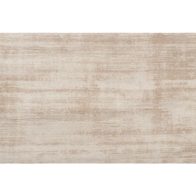 Hand-knotted in Art Silk, this 3x15 extra-long runner is a sophisticated addition to Rug & Kilim’s Textural collection....