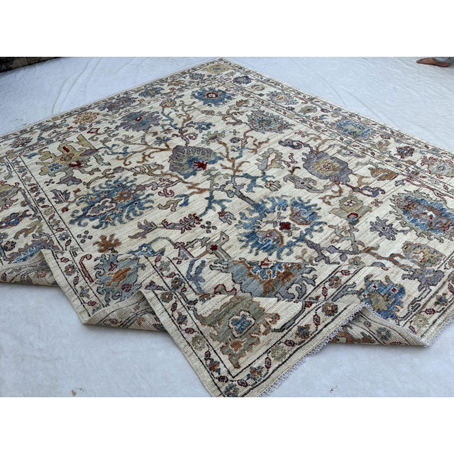 2000 - 2009 Oushak Handmade Wool Rug With Ivory and Blue Floral Pattern For Sale - Image 5 of 5