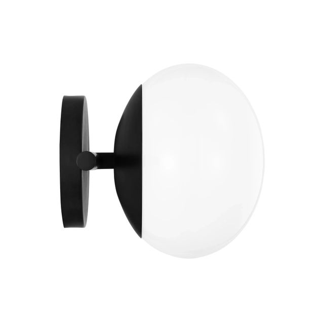 The Lune mid-century modern collection from Ellen DeGeneres is offered in two finishes including Aged Iron and Burnished...