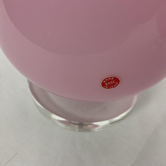 Add a touch of elegance to your home with this lovely pair of vintage pink Murano glass table lamps with Lucite bases....