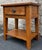 Great rustic oak farmhouse style side table by Broyhill from their Attic Heirlooms Collection. Single drawer with magazine...