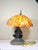 An extraordinary and exceptional Maitland Smith sculptural lighting work, distinguished by its monumental weight, mixed-...