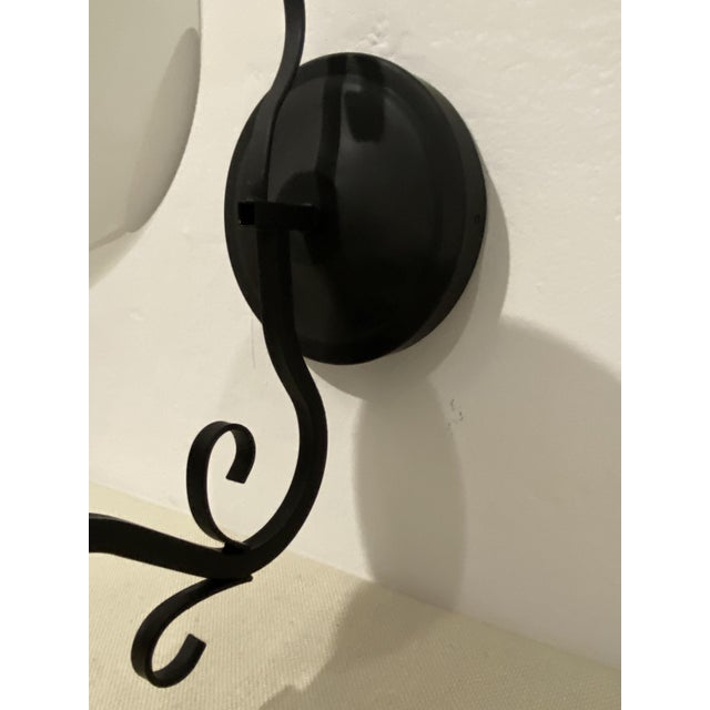 Very good restored vintage condition. The decorative metal structure has been newly powder-coated in matte black, the...